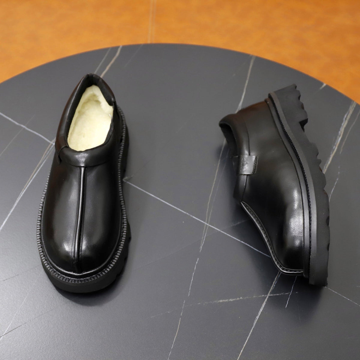 UGG Black Leather Slip-On Casual Shoes
